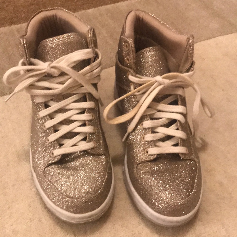 Glittery gold high top sneakers